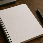 book and pen on the table for the heading of the post : How to Write Blog Posts That Actually Rank on Google